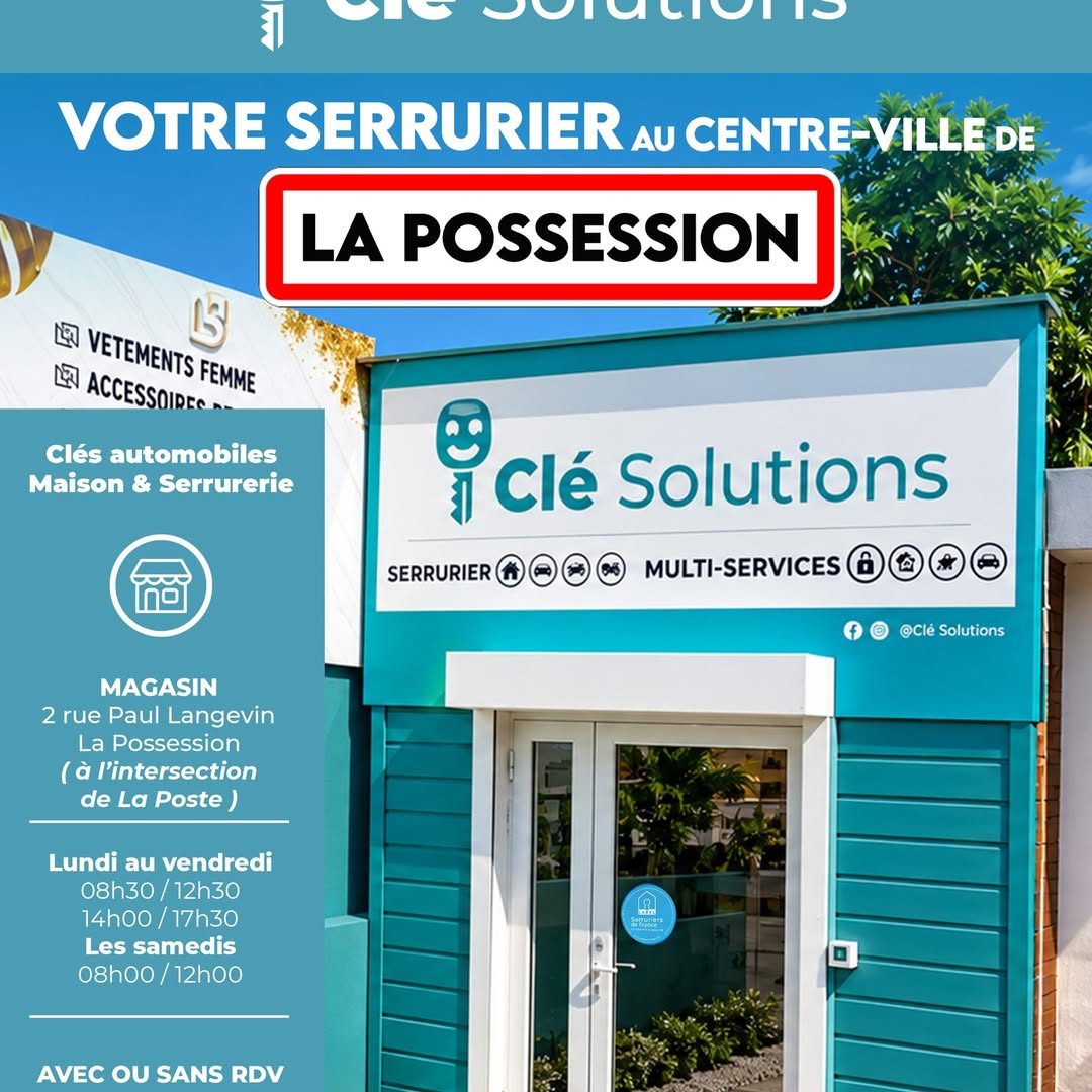 Façade turquoise du magasin Clé Solutions à La Possession